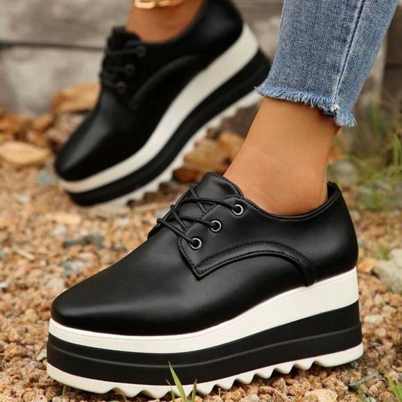 Shoes - Sleek Black Platform Women's Shoes..
only (1) 9.5 left.